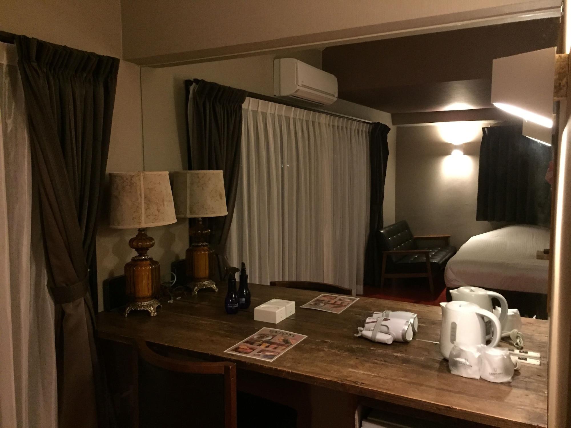 Hotel Sunset American Chatan Bagian luar foto